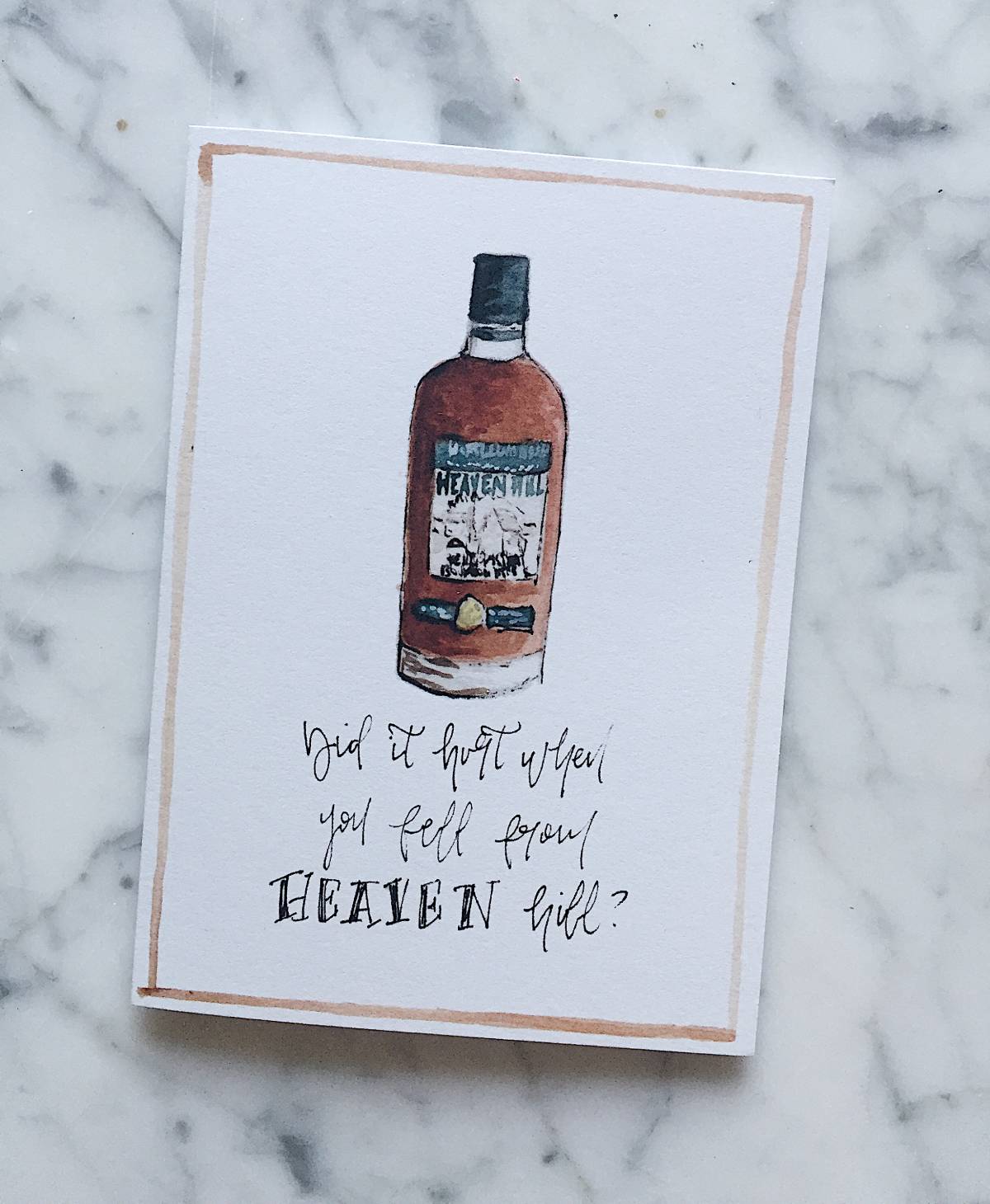 A bourbon Valentine's Day card with a bottle of Heaven Hill and the phrase "did it hurt when you fell from Heaven hill?