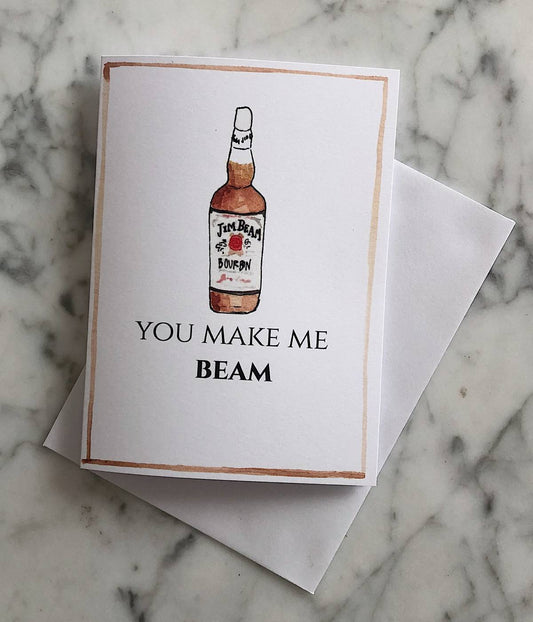 A bourbon Valentine's Day card with an illustration of Jim Beam and the text "you make me beam"